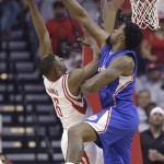 Houston Rockets' Terrence Jones (6) is blocked by Los Angeles Clippers' DeAndre Jordan, right, during the first half of Game 1 in a second-round NBA basketball playoff series Monday, May 4, 2015, in Houston. (AP Photo/David J. Phillip)