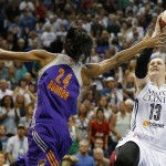 Minnesota Lynx guard Lindsay Whalen (13) pushes up to the basket against Phoenix Mercury guard DeWanna Bonner (24) during the second half of Game 2 of the WNBA basketball Western Conference finals, Sunday, Aug. 31, 2014, in Minneapolis. The Lynx won 82-77. (AP Photo/Stacy Bengs)