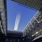 Planes fly over University of Phoenix Stadium as singer Idina Menzel performs the national anthem before the NFL Super Bowl XLIX football game between the Seattle Seahawks and the New England Patriots on Sunday, Feb. 1, 2015, in Glendale, Ariz. (AP Photo/Matt Rourke)