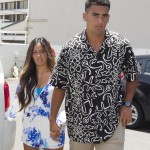 Former Oregon quarterback Marcus Mariota, right, along with his friend Kiyomi Cook arrive at the Saint Louis Alumni Clubhouse on NFL Draft Day Thursday, April 30, 2015, in Honolulu. (AP Photo/Eugene Tanner)