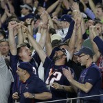 New England Patriots fans cheer during the second half of NFL Super Bowl XLIX football game against the Seattle Seahawks on Sunday, Feb. 1, 2015, in Glendale, Ariz. (AP Photo/Kathy Willens)