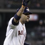 Houston Astros' Carlos Corporan waves as he hits a home run to left field during the fourth inning of a baseball game against the Arizona Diamondbacks, Thursday, June 12, 2014, in Houston. Robbie Grossman also scored. (AP Photo/Patric Schneider)
