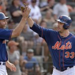 New York Mets' Matt Harvey, right, celebrates with teammate Eric Campbell after hitting a two-run home run scoring Campbell during the fifth inning of a baseball game against the Arizona Diamondbacks, Saturday, July 11, 2015, at Citi Field in New York. (AP Photo/Bill Kostroun)
