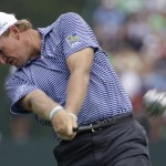 Ernie Els, of South Africa, hits his tee shot on the fifth hole during the final round of the PGA Championship golf tournament at Valhalla Golf Club on Sunday, Aug. 10, 2014, in Louisville, Ky. (AP Photo/David J. Phillip)