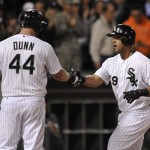  Chicago White Sox's Jose Abreu, right, celebrates with teammate Adam Dunn (44) at home plate after hitting a solo home run during the seventh inning of a baseball game against the Arizona Diamondbacks in Chicago, Friday, May 9, 2014. (AP Photo/Paul Beaty)