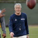 Seattle Seahawks' head coach Pete Carroll watches his team run drills during a team practice for NFL Super Bowl XLIX football game, Wednesday, Jan. 28, 2015, in Tempe, Ariz. The Seahawks play the New England Patriots in Super Bowl XLIX on Sunday, Feb. 1, 2015. (AP Photo/Matt York)
