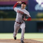  Arizona Diamondbacks starting pitcher Chase Anderson works against the Colorado Rockies in the first inning of a baseball game in Denver on Tuesday, June 3, 2014. (AP Photo/David Zalubowski)