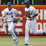 New York Mets center fielder Kirk Nieuwenhuis (9) and Mets left fielder John Mayberry Jr. (44) run in from the outfield after the Mets 5-3 win over the Arizona Diamondbacks in a baseball game in New York, Sunday, July 12, 2015. Nieuwenhuis hit three home runs in the game. (AP Photo/Kathy Willens)
