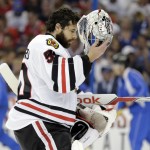 Chicago Blackhawks goalie Corey Crawford walks to the net after giving up a goal to Tampa Bay Lightning defenseman Jason Garrison during the third period in Game 2 of the NHL hockey Stanley Cup Final in Tampa, Fla., Saturday, June 6, 2015. (AP Photo/Chris O'Meara)