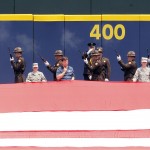  Deputy's perform a Twenty One Gun Salute before the start of a baseball game between the Boston Red Sox and the Atlanta Braves on Monday, May 26, 2014, in Atlanta, Ga. (AP Photo/Butch Dill)
