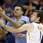 Phoenix Suns' Goran Dragic (1), of Slovenia, battles Los Angeles Clippers' Matt Barnes, left, for the ball during the second half of an NBA basketball game Sunday, Jan. 25, 2015, in Phoenix. The Clippers defeated the Suns 120-100. (AP Photo/Ross D. Franklin)