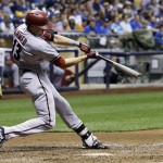 Arizona Diamondbacks' Nick Ahmed hits a home run during the eighth inning of a baseball game against the Milwaukee Brewers on Friday, May 29, 2015, in Milwaukee. (AP Photo/Morry Gash)