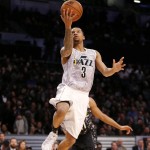 U.S. Team's Trey Burke, of the Utah Jazz, goes up for a basket against the World Team during the first half of the Rising Stars NBA All-Star Challenge basketball game, Friday, Feb. 13, 2015, in New York. (AP Photo/Julio Cortez)