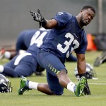 Seattle Seahawks' Christine Michael stretches during a team practice for NFL Super Bowl XLIX football game, Thursday, Jan. 29, 2015, in Tempe, Ariz. The Seahawks play the New England Patriots in Super Bowl XLIX on Sunday, Feb. 1, 2015. (AP Photo/Matt York)
