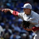 Arizona Diamondbacks pitcher Trevor Cahill pitches against the Chicago Cubs during the seventh inning of a baseball game at Wrigley Field in Chicago on Wednesday, April 23, 2014. (AP Photo/Andrew A. Nelles)