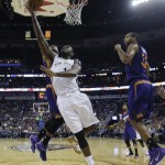 New Orleans Pelicans guard Tyreke Evans (1) drives to the basket in the first half of an NBA basketball game against the Phoenix Suns in New Orleans, Friday, April 10, 2015. (AP Photo/Gerald Herbert)
