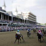 Victor Espinoza rides American Pharoah to victory in the 141st running of the Kentucky Derby horse race at Churchill Downs Saturday, May 2, 2015, in Louisville, Ky. (AP Photo/Matt Slocum)