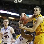 Wyoming's Larry Nance Jr., right, and Northern Iowa's Marvin Singleton (12) battle for a rebound during the first half of an NCAA tournament college basketball game in the Round of 64 in Seattle, Friday, March 20, 2015. (AP Photo/Ted S. Warren)