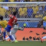 Chile's Mauricio Pinilla, centre, hits the bar with a shot during the World Cup round of 16 soccer match between Brazil and Chile at the Mineirao Stadium in Belo Horizonte, Brazil, Saturday, June 28, 2014. (AP Photo/Martin Meissner)