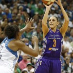 Phoenix Mercury guard Diana Taurasi (3) shoots against Minnesota Lynx forward Rebekkah Brunson during the first half of Game 2 of the WNBA basketball Western Conference finals, Sunday, Aug. 31, 2014, in Minneapolis. (AP Photo/Stacy Bengs)