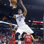 Orlando Magic forward Tobias Harris (12) loses the ball as he drives to the basket in the first half of an NBA basketball game against the New Orleans Pelicans in New Orleans, Tuesday, Oct. 28, 2014. (AP Photo/Gerald Herbert)