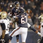 Chicago Bears wide receiver Marquess Wilson (10) celebrates touchdown with Chicago Bears tackle Jordan Mills (67) during the second half of an NFL football game against the New Orleans Saints Monday, Dec. 15, 2014, in Chicago. (AP Photo/Nam Y. Huh)