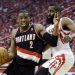 Portland Trail Blazers' Wesley Matthews (2) tries to drive past Houston Rockets' James Harden during the first half in Game 1 of an opening-round NBA basketball playoff series, Sunday, April 20, 2014, in Houston. (AP Photo/David J. Phillip)