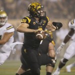 Arizona State quarterback Mike Bercovici (2) looks to throw against UCLA during the first half of an NCAA college football game, Thursday, Sept. 25, 2014, in Tempe, Ariz. (AP Photo/Matt York)