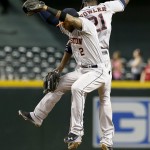  Houston Astros' Jonathan Villar (2) and Dexter Fowler, right, celebrate after the final out of the ninth inning of a baseball game against the Arizona Diamondbacks on Monday, June 9, 2014, in Phoenix. The Astros won 4-3. (AP Photo/Ross D. Franklin)
