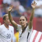 United States' Alex Morgan waves after the FIFA Women's World Cup soccer championship final against Japan in Vancouver, British Columbia, Canada, Sunday, July 5, 2015. The United States won 5-2. (Jonathtan Hayward/The Canadian Press via AP)