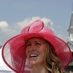 Kimi Fox looks around the paddock before the 141st running of the Kentucky Derby horse race at Churchill Downs Saturday, May 2, 2015, in Louisville, Ky. (AP Photo/Charlie Riedel)