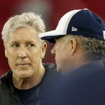 Seattle Seahawks head coach Pete Carroll, left, talks with quarterbacks coach Carl Smith during a team practice for NFL Super Bowl XLIX football game, Friday, Jan. 30, 2015, in Tempe, Ariz. The Seahawks play the New England Patriots in Super Bowl XLIX on Sunday, Feb. 1, 2015. (AP Photo/Matt York)