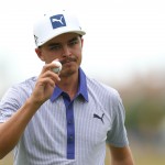 Rickie Fowler of the US acknowledges the crowd after a birdie on the 18th hole during the third day of the British Open Golf championship at the Royal Liverpool golf club, Hoylake, England, Saturday July 19, 2014. (AP Photo/Scott Heppell)