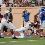 Elon defensive back Miles Williams (2) can't keep Duke wide receiver Issac Blakeney (17) from scoring during the second quarter of an NCAA college football game Saturday, Aug. 30, 2014, in Durham, N.C. Duke won 52-13. (AP Photo/The News & Observer, Chuck Liddy)