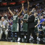 The UAB bench cheers after guard Robert Brown hit a 3-point basket in the closing seconds of the second half against Iowa State in the second round of the NCAA college basketball tournament in Louisville, Ky., Thursday, March 19, 2015. UAB won the game 60-59. (AP Photo/David Stephenson)