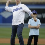 Hall of Fame thoroughbred trainer and Triple Crown winner Bob Baffert throws the ceremonial first pitch before a baseball game between the Los Angeles Dodgers and the Arizona Diamondbacks, Tuesday, June 9, 2015, in Los Angeles. (AP Photo/Jae C. Hong)