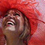 Sara Ward looks up before the 141st running of the Kentucky Oaks horse race at Churchill Downs Friday, May 1, 2015, in Louisville, Ky. (AP Photo/Darron Cummings)