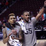 Georgetown guard D'Vauntes Smith-Rivera, left, celebrates with teammate Jabril Trawick after winning an NCAA college basketball second round game against Eastern Washington in Portland, Ore., Thursday, March 19, 2015. Smith-Rivera scored 25 points as Georgetown won 84-74. (AP Photo/Craig Mitchelldyer)
