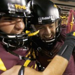Arizona State's Zane Gonzalez, right, smiles as he celebrates his game-winning field goal against Utah with teammate Shane Till, left, after overtime in an NCAA college football game on Saturday, Nov. 1, 2014, in Tempe, Ariz. Arizona State defeated the Utah 19-16 in overtime. (AP Photo/Ross D. Franklin)