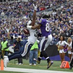 San Diego Chargers strong safety Marcus Gilchrist, left, breaks up a pass-attempt to Baltimore Ravens wide receiver Torrey Smith in the first half of an NFL football game, Sunday, Nov. 30, 2014, in Baltimore. (AP Photo/Nick Wass)