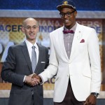 Myles Turner, right, poses for photos with NBA Commissioner Adam Silver after being selected 10th overall by the Indiana Pacers during the NBA basketball draft, Thursday, June 25, 2015, in New York. (AP Photo/Kathy Willens)
