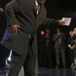 Former NFL player Cincinnati Bengals Ickey Woods does the Ickey Shuffle before he announces that the Bengals selects Oregon offensive lineman Jake Fisher as the 53rd pick in the second round of the 2015 NFL Football Draft, Friday, May 1, 2015, in Chicago. (AP Photo/Charles Rex Arbogast)
