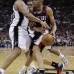 Portland Trail Blazers' Nicolas Batum, right, is pressured by San Antonio Spurs' Boris Diaw, left, of France, during the second half of Game 2 of a Western Conference semifinal NBA basketball playoff series, Thursday, May 8, 2014, in San Antonio. San Antonio won 114-97. (AP Photo/Eric Gay)