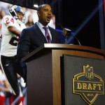Former NFL player Eric Brown announces the Houston Texans selects Mississippi State linebacker Benardrick Mckinney as the 43rd pick in the second round of the 2015 NFL Football Draft, Friday, May 1, 2015, in Chicago. (AP Photo/Charles Rex Arbogast)