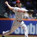 Arizona Diamondbacks starter Bronson Arroyo pitches against the New York Mets in the first inning in game one of a double header baseball game at Citi Field on Sunday, May 25, 2014, in New York. (AP Photo/Kathy Kmonicek)