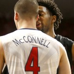 Stanford guard Chasson Randle, right, and Arizona guard T.J. McConnell (4) have words during the first half of an NCAA college basketball game, Saturday, March 7, 2015, in Tucson, Ariz. (AP Photo/Rick Scuteri)