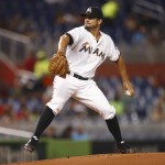 Miami Marlins' Brad Hand pitches to the Arizona Diamondbacks during the first inning of a baseball game in Miami, Friday, Aug. 15, 2014. (AP Photo/J Pat Carter)