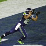 Seattle Seahawks wide receiver Doug Baldwin (89) prepares to make a touchdown catch against the New England Patriots during the second half of NFL Super Bowl XLIX football game Sunday, Feb. 1, 2015, in Glendale, Ariz. (AP Photo/Charlie Riedel)