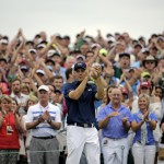 Jordan Spieth applauds after winning the Masters championship during the fourth round of the Masters golf tournament Sunday, April 12, 2015, in Augusta, Ga. (AP Photo/David J. Phillip)