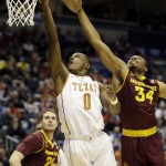  Texas guard Kendal Yancy (0) goes up for a shot against Arizona State guard Jermaine Marshall (34) during the first half of a second-round game in the NCAA college basketball tournament Thursday, March 20, 2014, in Milwaukee. (AP Photo/Jeffrey Phelps)